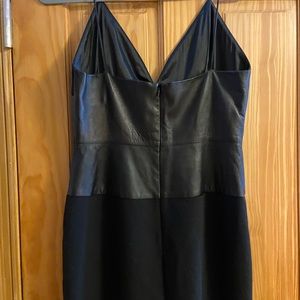 Black crepe and leather knee length dress